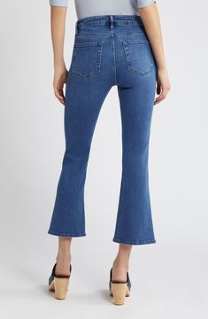 Made from premium stretch denim, these cropped jeans offer an updated take on the '70s trend with a contoured mid waist and slightly flared legs. 26 1/2" inseam, 18" leg opening; 11" front rise; 15" back rise (size 29) Zip fly with button closure Five-pocket style 77% cotton, 19% rayon, 3% elasterell-p, 1% elastane Machine wash, dry flat Imported t.b.d. Medium Wash Stretch Flare Jeans With Cropped Leg, Stretch Medium Wash Cropped Leg Flare Jeans, Stretch Denim Blue Cropped Flare Jeans, Flared Cropped Jeans In Denim Blue For Spring, Spring Flared Cropped Denim Blue Jeans, Boot Jeans, T B, Fabric Gifts, Free Fabric