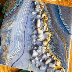 "Geode Mini Art inspired by one of the most serene stones in my collection. I have loved blue lace agate for all its delicate lines and soft beautiful color. This mini Geode painting is a calm shade of blue and has lots of details and textures. A Small Luxury with lots of Sparkle for your space. This painting Is done on a cradled birch board, 6\"x6\" inch with a height of 1.5\" I hope you like it xx lol" Blue Geode, Geode Art, Crystal Geode, Crystals In The Home, Luxury Art, Agate Crystal, Love Blue, Blue Lace Agate, Crystal Art