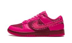 The Women’s Nike Dunk Low “Valentine’s Day” is a women’s-exclusive release of the classic sneaker in a unique colorway that pays homage to Valentine’s Day.  A February 2022 release, the “Valentine’s Day” version of the Dunk Low succeeds popular Dunks that have shown love to the holiday before it, including StrangeLove Skateboards’ collaboration with the Nike SB Dunk in 2020.  This “Valentine’s Day” Dunk features a maroon canvas base with pink tumbled leather overlays.  A pink suede Swoosh can be Womens Dunk Low, Wmns Dunk Low, Nike Website, Gymnastics Shoes, Sneakers Box, Kobe Shoes, Nike Brand, Sneaker Release, Pink Nikes