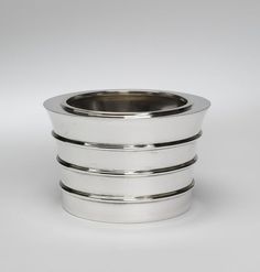 three tiered silver plate on a white background