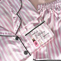 Our bestselling personalised pyjamas look just like Victorias Secret for half the price! Glamorous Pink and White Stripes with a button front, shirt collar and decorative piping. They are easy fit and are personalised with your Birthday image, age and name on the shirt pocket. the price also includes a matching personalised bag for your special pyjamas. The cutest Birthday gift for yourself or a loved one. Our super soft pyjamas come in two pieces including, a long sleeved top and trousers. The waist is elasticated for a comfy fit, which you can either sit on your waist or lower down on your hips depending on the fit you prefer. Satin pyjamas are perfect for the winter nights to keep comfortable at bedtime! 💕 We also have these pyjamas with just a name if you want a more classic look. Che Pink Letter Print Sets For Pajama Party, Pink Long Sleeve Sets For Birthday, Pink Long Sleeve Birthday Set, Pink Sleepwear With Letter Print For Pajama Party, Personalised Pyjamas, Satin Pyjamas, Satin Pjs, Birthday Image, Pyjama Satin