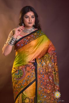 This Indian ethnic sari is an exquisite combination of hand acid painting creating a soothing Mix colour Dye with AN UNIQUE DESIGN Madhubani painting, where Madhubani art is presented on Border and Pallu. Madhubani painting is done with help of nib pens, twigs, by using Fabric colours and pigments. Madhubani art was created centuries ago by women of Mithila region of the Indian subcontinent. Earlier it was done on fresh mud walls but now it is also done on cloth, handmade paper and canvas. his e Artistic Multicolor Tussar Silk Saree, Artistic Tussar Silk Saree For Festivals, Artistic Tussar Silk Saree, Artistic Tussar Silk Traditional Wear, Artistic Multicolor Saree With Zari Work, Artistic Tussar Silk Traditional Wear With Zari Work, Artistic Tussar Silk Saree With Motifs, Artistic Tussar Silk Saree With Cutdana, Artistic Traditional Wear With Zari Work On Tussar Silk