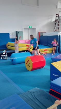 children playing in an indoor trampoline gym