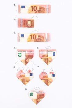 four different bills are arranged in order to form the shape of an origami heart