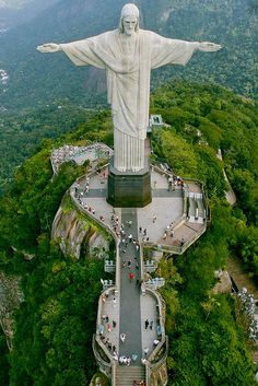 an aerial view of the statue of christ on top of a mountain in rio cristo