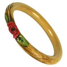 French Art deco carved bakelite rose bangle bracelet. The tubular cream color bracelet all hand carved with a sienna brown stain and cold painted with pink unfurling rose and green stained leaves Excellent Condition. 1920's France. Width .50" Interior Diameter 2 5/8" 1950s Jewellery, 1950s Jewelry, Bakelite Jewelry, Bakelite Bangles, Color Bracelet, Mid Century Jewelry, French Art Deco, Vintage Jewels, Colorful Bracelets