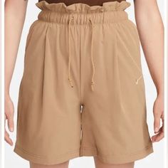 Nike Modern High Waist Drawstring Shorts In Dark Driftwood/Hemp Size M Or Xl Nwt A High Waist And Roomy Fit Bring All-Activity Comfort To Shorts Made Of A Soft Fabric That Breathes With You Whether You're Playing Or Relaxing. 7" Inseam; 29" Leg Opening; 14 1/2" Front Rise; 19" Back Rise (Size Medium) Measurements Are Approx Mesh Lining 86% Polyester, 14% Spandex Machine Wash, Tumble Dry Imported A Curated Lifestyle Destination Where Fashion Is The Ultimate Sport Items Are Retail Store Purchases Baige Nike Shorts, Nike Cotton Shorts, Pink Nike Pros, Nike Sweat Shorts, High Wasted Shorts, Nike Shorts Women, Black Nike Shorts, Nike Sportswear Women, Biker Shirts