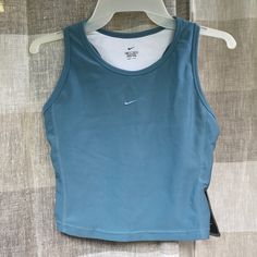 Didn’t Ask Me Please For Pit To Pit Measure. It Is Maximum Sz 6! Functional Blue Top For Spring, Functional Blue Spring Top, Casual Blue Tops For Training, Sporty Light Blue Training Tops, Nike Sleeveless Tank Top, Sporty Navy Nike Top, Nike Sports Tank Top, Nike Blue Sleeveless Tank Top, Nike Sleeveless Go-dry Tank Top