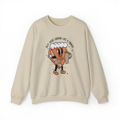 Get ready to be the center of attention with our 'Lookin Like A Snack Sweater'. This funny Thanksgiving sweater is perfect for adding some humor to your holiday wardrobe. Featuring a cute pumpkin pie design, this sweater will make you look good enough to eat! Made from high-quality materials, it is not only stylish but also comfortable to wear. Whether you're attending a Thanksgiving dinner or just want to spread some holiday cheer, this pumpkin pie sweater is sure to turn heads and put a smile Cute Sweater For Fall Streetwear, Funny Print Sweatshirt For Fall, Funny Streetwear Sweatshirt For Fall, Funny Graphic Print Sweatshirt For Winter, Funny Long Sleeve Sweatshirt For Fall, Casual Funny Print Winter Sweatshirt, Fun Crew Neck Winter Sweatshirt, Fun Winter Crew Neck Sweatshirt, Casual Winter Sweatshirt With Funny Print