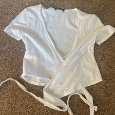 White Cross Top, Perfect Condition, One Size, Never Worn White Wrap Top For Summer, White Wrap Tops For Summer, Casual White Wrap Top, Cotton Wrap Top For Day Out, White Brandy Melville Top, Brandy Melville Milkmaid Top, Brandy Melville Cherub Top, Zelly Stripe Top Brandy Melville, Brandy Melville Top