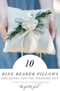 a person holding a ring bearer pillow with the words 10 ring bearer pillows and boxes for the wedding day