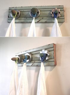 two pictures of towels hanging from hooks on a wall