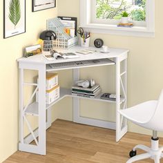 a white computer desk sitting under a window