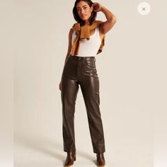 Ultra High Rise Pants In Our Luxe Vegan Leather Fabric, Featured In Our Curve Love 90s Straight Fit, With Functional Pockets And A Zipper Closure. Curve Love Features An Additional 2 Inches Through The Hip And Thigh From Our Classic Vegan Leather 90s Straight Pants. Imported. Faux Leather:90% Polyester, 10% Elastane / Coating:100% Polyurethane 90s Silhouette, Brown Leather Pants, Pleather Pants, Leather Pant, Love Jeans, Abercrombie And Fitch Jeans, Brown Pants, Faux Leather Pants, Light Wash Jeans