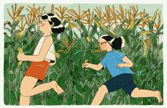 two women running through tall grass in front of corn stalks, one wearing blue and the other red