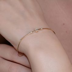 "Solid Gold Diamond, Diamond Bracelet, Bar Baguette Bracelet Diamond, High Quality Bracelet,Valentine's Day Gif, Only You Item Details * Made to Order * Gold KT: 14K or 18K * Custom Gold Color: Rose Gold, Yellow Gold, White Gold * Baguette diamond:3 pcs 2mm * Round Diamond: 8 pcs.    * Total CTW: 0.10 ctw * Diamond Color-Clarity: E Color SI Clarity If you have any additional questions about this bracelet, just hit the \"Message \" button and we will get back to you within a few hours. ★ ★ ★ Each Fine Jewelry Bangle With Baguette Diamonds For Gift, 14k Gold Baguette Diamond Bracelets, Yellow Gold Bangle With Baguette Diamonds For Wedding, Yellow Gold Wedding Bangle With Baguette Diamonds, Delicate Gold Jewelry With Baguette Diamonds, Wedding Yellow Gold Bangle With Baguette Diamonds, 14k Gold Bracelets With Baguette Diamonds, Gift Yellow Gold Diamond Bracelet With Baguette Diamonds, Gold Bracelets With Baguette Diamonds In 14k Gold