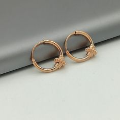 IMPORTANT **Please go through all the pictures i have posted for a listing with a ruler, on a model, on my hand, to get an exact idea of the actual size of the item. ✦Please go through all the pictures on this listing to get a clear idea of the actual size of the piece. Bali style sterling silver ear hoops dipped in real rose gold. Dimensions: 1.2 x 10 mm Price listed is for a pair of ear hoops. These earrings are made of 925 hypoallergenic sterling silver. All my pieces are sent in a gift box. Adjustable Rose Gold Cartilage Earrings, Adjustable Rose Gold Huggie Earrings, Nickel-free Small Hoop Huggie Earrings In Rose Gold, Rose Gold Nickel-free Small Hoop Huggie Earrings, Small Hoop Earrings In Rose Gold, Rose Gold Hoop Nose Rings As Gift, Rose Gold Small Hoop Cartilage Earrings, Rose Gold Hypoallergenic Hoop Cartilage Earrings, Dainty Small Hoop Earrings In Rose Gold