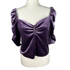 New With Tags Lavender Purple Velvet Crop Top With Sweetheart Neckline And Elastic At Top Of Shoulders Allowing To Be Worn Off Shoulder. 1/2 Sleeves With Ruching Down The Center. Pet Friendly, Smoke Free Home. 95% Polyester, 5% Spandex Size 1x Measurements (Laying Flat): Armpit To Armpit - 19" (Relaxed); Sleeve - 12"; Length - 17" Please Contact Us With Any Questions. Please Feel Free To Make An Offer. Thanks For Shopping With Us! Trendy Ruched Purple Top, Trendy Purple Ruched Top, Velvet Purple, Short Sleeve Linen Shirt, Character Clothing, Pixie Hollow, Velvet Crop Top, Ruched Sleeve, Glam Style