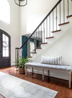 the entryway is clean and ready to be used as a sitting area for guests