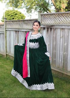 Our Afghan dress is a stunning piece of clothing that celebrates the beauty of traditional Afghan embroidery. The dress is handcrafted by skilled artisans who specialize in the intricate Charma embroidery style. The Charma embroidery is a unique style that has been passed down for generations and is known for its detailed patterns and vibrant colors. The dress features a long skirt that flows beautifully, adding elegance and grace to the overall look. The length of the dress can be customized to fit your preferences, with options for both short and long lengths. Additionally, the dress can be made in any color of your choice, allowing you to express your personal style and preferences. The Charma embroidery on the dress is a true masterpiece, with each stitch being carefully crafted to cre Traditional Semi-stitched Maxi Dress With Dabka Work, Traditional Long Sleeve Maxi Dress With Dupatta, Green Anarkali Embroidered Dress, Green Anarkali Dress With Traditional Drape, Traditional Green Abaya For Festive Season, Traditional Green Abaya For Festive Occasions, Traditional Green Abaya With Dabka Work, Traditional Long Sleeve Abaya With Dupatta, Anarkali Abaya With Dupatta For Eid