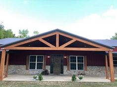 a house that is made out of wood and stone