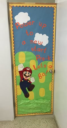 a door decorated with an image of mario and the words power up to new start