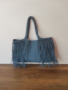 MATERIALS USED * High quality navy blue paper rope ( Even if it gets wet, its structure does not deteriorate) * Knitted strap * inner lining * Closes with a magnetic clasp * With a dust bag (gift) SIZING * Length: 19,4 inch  (50 cm ) * Width: 12,2 inch  (31 cm  ) * Strap: 10 inch  (25 cm ) * Weight: 450 gr (As the product is handmade, each bag can vary by 1 inch or so.) CARE *Hand wash or machine wash at low temperature. *Colours will not mix.  *Dry on a flat surface. *Not dry cleaned. *Can be i Paw Art, Large Beach Bag, Large Beach Bags, Pink Paws, Straw Beach Bag, Summer Love, Boho Bag, Large Bag, Magnetic Clasp