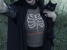 Embrace the spooky season with a touch of humor! Our "Feeling a Little Hollow Inside" t-shirt features a cool, cobweb-covered ribcage design that's perfect for Halloween or any time you're feeling a little empty (in the funniest way possible). This tee combines creepy and cute, making it a great addition to your collection for casual wear, costume parties, or just showing off your skeleton vibes. Lightweight and comfortable, it's the perfect statement piece for the undead at heart! Welcome to Gr Ribcage Design, Halloween Costume Funny, Skeleton Tshirt, Skeleton Halloween Costume, Cage Thoracique, Costume Parties, Skeleton Halloween, Design Cool, Halloween Skeleton