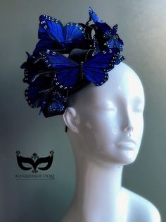 This elegant blue butterfly women's fascinator makes the perfect holiday gift! Featuring monarch butterflies in a variety of colors on a black fascinator base and headband/clip option. You have the option to pick other colors listed or a mix color option! I N C L U D E D Black fascinator on headband base topped with high-quality intricately detailed butterflies. In secure box packaging to keep form. S H I P P I N G - Processed same day or within 24 hours. 1-2 day guaranteed delivery, add item to Blue Costume Hats And Headpieces For Races In Spring, Blue Costume Hats And Headpieces For Spring Evenings, Blue Spring Fascinator For Formal Occasions, Blue Mini Hat Headband For Spring, Blue Summer Costume Hats And Headpieces For Party, Blue Spring Formal Fascinator, Blue Hat For Spring, Spring Blue Formal Fascinator, Formal Blue Costume Hats And Headpieces For Spring