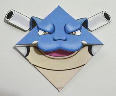 an origami avatar with two knives sticking out of it's mouth and eyes