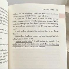 an open book with some writing on the page and one in it's corner