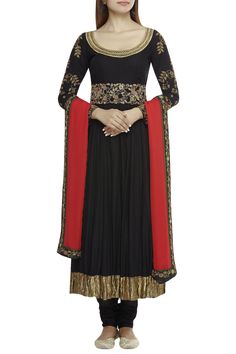 Black anarkali with placement floral motif work. Paired with plain churidar and cutwork detail tie-up belt. Comes with red dupatta.
Components: 4
Neckline: U Neckline
Sleeve Length: Full sleeves
Fabric: Raw Silk, Matka Silk, Chiffon
Color: Black, Red
Kurta, belt: Zardozi embroidery
Belt: Sequin, bead embellished
Tassel tie-up detail
Tiered sharara pants
Closure:
Kurta: Side zip
Cutwork detail belt - Aza Fashions Black Anarkali Set With Embroidered Border For Diwali, Floor-length Dupatta With Embroidered Border, Fitted Floor-length Dupatta With Embroidered Border, Anarkali Salwar Kameez With Embroidered Border In Georgette, Fitted Georgette Anarkali Set With Embroidered Border, Black Anarkali Set With Embroidered Border For Festivals, Navratri Black Georgette Anarkali Set, Black Anarkali Kurta With Embroidered Border, Bollywood Style Floor-length Churidar With Embroidered Border