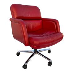 a red leather office chair with chrome legs and casteors on an isolated white background