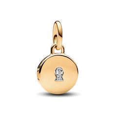 Keep what's most dear to you close to your heart with the Openable & Engravable Love Locket Dangle Charm. This 14k gold-plated locket charm features a clear cubic zirconia stone on the front in the shape of a keyhole, and opens and closes securely so you can keep a tiny picture, note or lock of hair inside. The inside of the locket is engraved with the message "TODAY TOMORROW ALWAYS", and the back is blank for your own engraving. Wear it on your Pandora Moments necklace or bracelet as a symbol of keeping your love safe and a reminder to cherish it, every day. Today Tomorrow Always, Charms Disney, Love Locket, Locket Gold, Pandora Gold, Charms Pandora, Bracelet Pandora, Charm Holder, Hair Locks