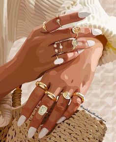 two women's hands holding each other with gold rings on their fingers and one woman's hand