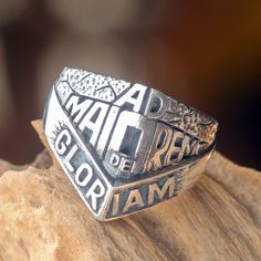 Appearing as if chiseled from stone the Jesuit motto 'Ad Maiorem Dei Gloriam' is engraved in this men's ring from Balinese artisan Henry Anthony Sanny. The Latin phrase translates to For the greater glory of God . The inspirational ring is crafted from solid sterling silver..925 Sterling silver Sterling Silver Engraved Ring For Commemoration, Symbolic Sterling Silver Engraved Ring For Commemoration, Silver Engraved Ring For Commemoration, Sterling Silver Signet Ring For Commemoration, Spiritual Ring, Glory Of God, Gift Suggestions, Sterling Silver Mens, Balinese