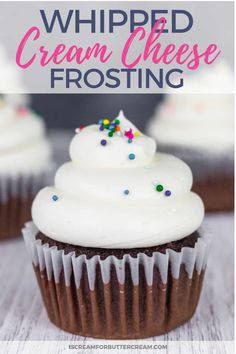 chocolate cupcakes with white frosting and sprinkles on top are shown