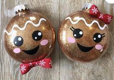 two christmas ornaments with faces on them