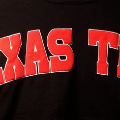 Go all out on expressing your passion for the Texas Tech Red Raiders with this Laurels Crop T-shirt. Its big, bold Texas Tech Red Raiders graphics printed on the front and back make your team devotion undeniable. The drop shoulder sleeves also allow you to move around more freely and comfortably.Go all out on expressing your passion for the Texas Tech Red Raiders with this Laurels Crop T-shirt. Its big, bold Texas Tech Red Raiders graphics printed on the front and back make your team devotion un Black Tops With Team Spirit Lettering, Red Text Print Top For College, Black Collegiate Tops With Lettering, Red Crew Neck T-shirt With Lettering, Low Puff, Crop Long Sleeve, Texas Tech Red Raiders, Red Raiders, Spirit Jersey