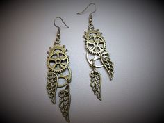 This Dangle & Drop Earrings item is sold by TravelingKelsey. Ships from Los Angeles, CA. Listed on May 15, 2024 Steampunk Metal Earrings For Pierced Ears, Handmade Adjustable Steampunk Earrings, Gold Steampunk Earrings, Steampunk Brass Jewelry For Pierced Ears, Steampunk Nickel-free Brass Earrings, Steampunk Brass Nickel-free Earrings, Nickel Free Metal Steampunk Earrings, Handmade Steampunk Brass Earrings, Handmade Steampunk Gold Earrings