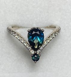 (eBay) Find many great new & used options and get the best deals for 1.12ct Natural Blue Teal Parti Pear Sapphire Wishbone Tiara Chevron Ring, 18k WG at the best online prices at eBay! Free shipping for many products! Wish Bone, Australian Sapphire, Chevron Ring, Blue Teal, Pear Shape, Queensland, Tiara, Natural Diamonds, Ebay Finds