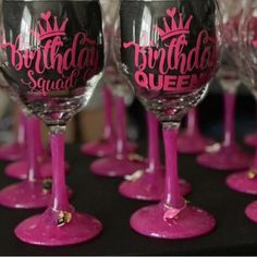 there are many wine glasses that have pink lettering on the bottom one is for birthday queen