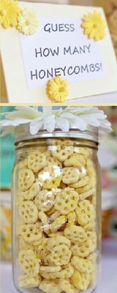 there is a jar full of honeycombs on top of a table with a sign