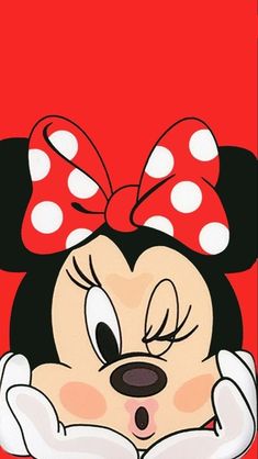 a cartoon minnie mouse with a bow on her head