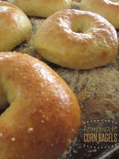 baked bagels are sitting on a baking sheet