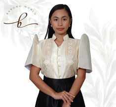 Organza Barong Tagalog Blouse for women, a sophisticated blend of tradition and modern elegance. Crafted from luxurious organza fabric, this blouse features intricate embroidery that pays homage to classic Filipino craftsmanship. The lightweight and sheer texture of the organza adds a delicate touch, while the carefully designed patterns enhance the blouse's timeless appeal. The Barong Tagalog silhouette is tailored to provide a flattering fit, with a subtle V-neckline and elegant button-down front. Perfect for formal occasions or cultural events, this blouse seamlessly combines heritage with contemporary style. Embrace tradition with a modern twist and make a statement of grace and refinement. Traditional Blouse With Embroidered Sleeves, Formal Blouse Piece With Floral Embroidery, Elegant Short Sleeve Wedding Blouse Piece, Fitted Embroidered Organza Blouse, Fitted Organza Blouse With Embroidery, Traditional Evening Blouse In Organza, Elegant Blouse With Embroidered Sleeves For Wedding, Elegant Organza Blouse Piece, Formal Blouse With Embroidered Sleeves