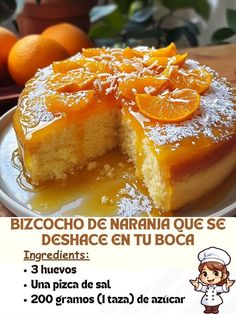 a cake with oranges on it sitting on a plate