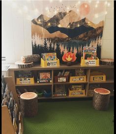 the bookshelf is filled with children's books and other things to read