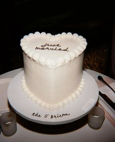 a heart shaped cake on a white plate