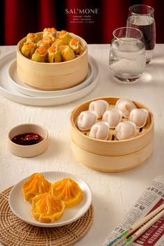 there are some food on the table and one is in a wooden bowl with chopsticks next to it